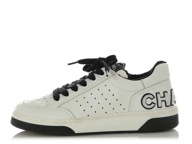 Chanel Black and White Sneakers in Black Leather from Ann's Fabulous Finds