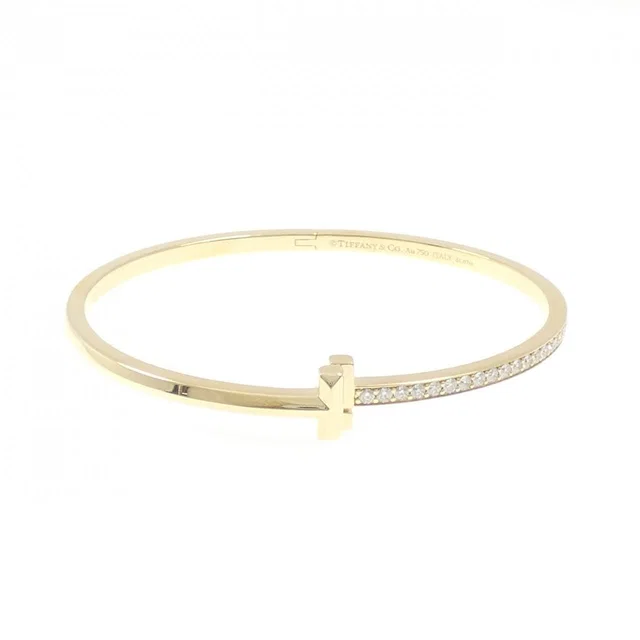 Tiffany & Co. One Narrow Hinge Bangle Bracelet from The Reluxe