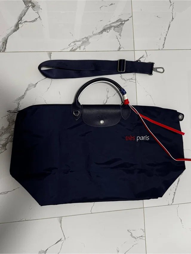Longchamp L Travel Tote Tres Paris Limited Edition in red|blue from Poshmark