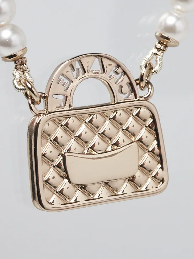 Chanel Gold Metal Faux Pearl and Chain Flap Bag Necklace in Gold from Yoogis, photo 3 of 6