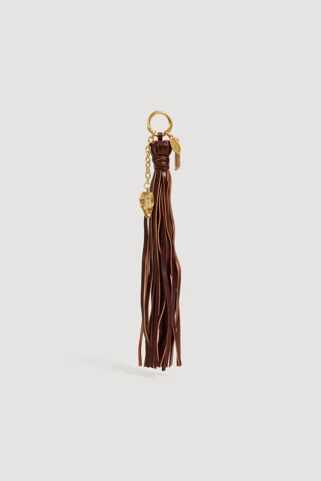 AJE Nokaya Tassle Charm in Beige from Aje, photo 1 of 1
