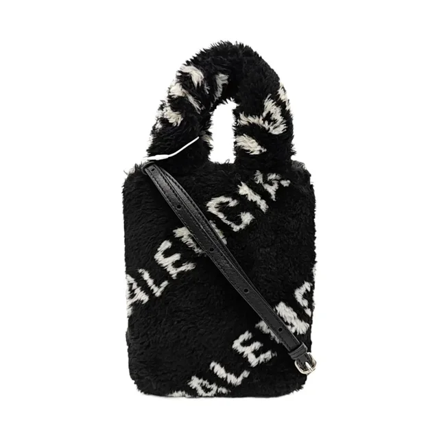 Balenciaga Logo Print Shearling Crossbody Bag in black Leather from Grailed