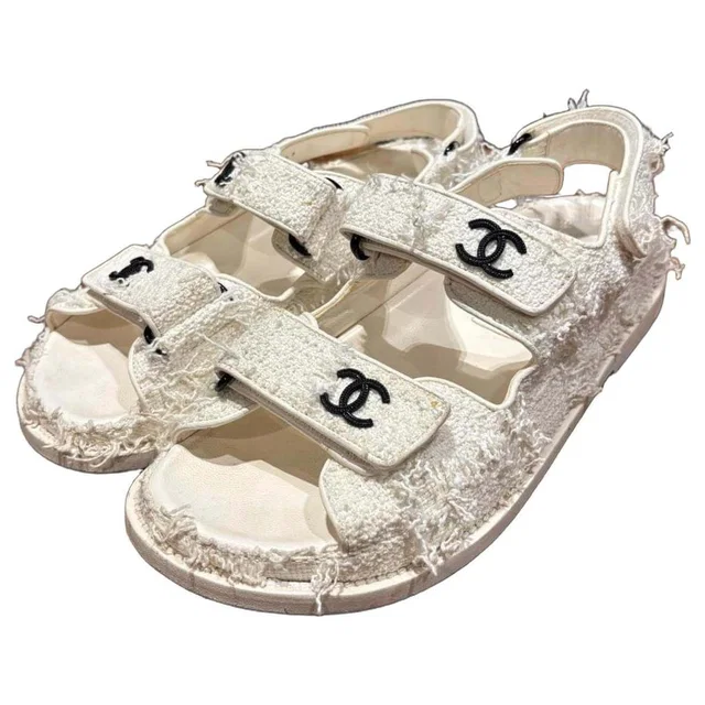Chanel White Textile with frayed edges, rubber sole Sandals in White from HEWI