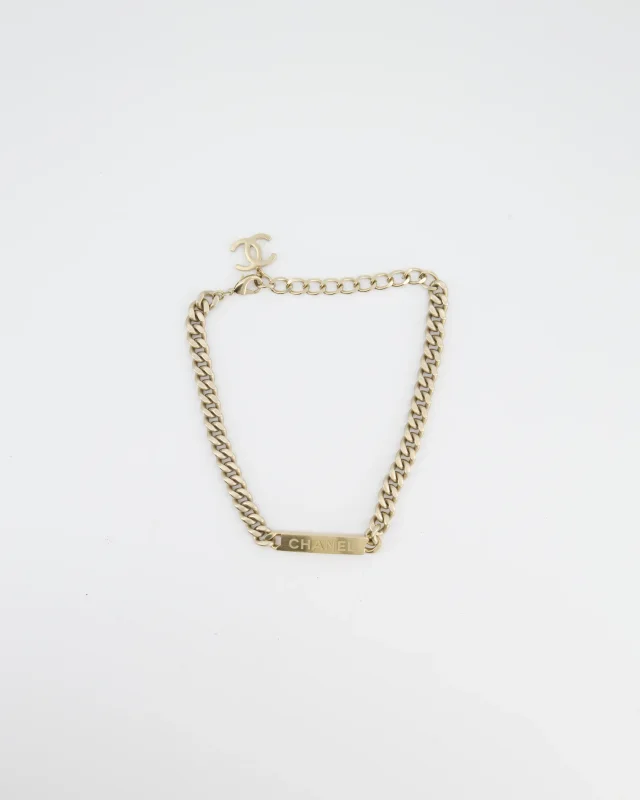 Chanel Gold Curb Link Chain Necklace with Logo Plate and CC Charm in Gold from Sellier, photo 8 of 8