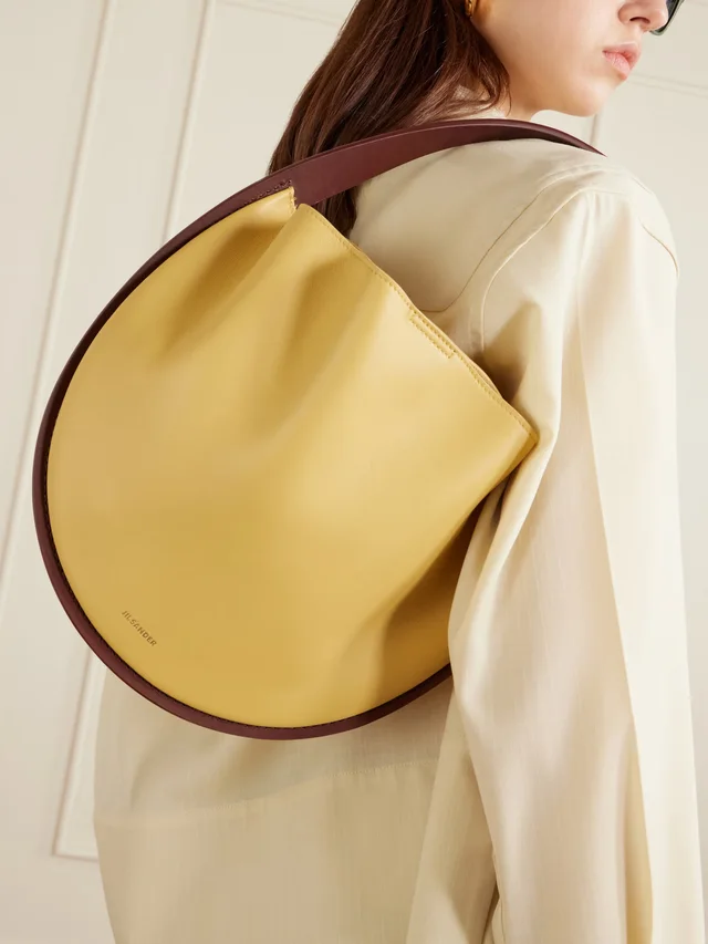 JIL SANDER Pivot leather shoulder bag - yellow - One Size in Yellow, photo 3 of 6 from NET-A-PORTER (Canada)