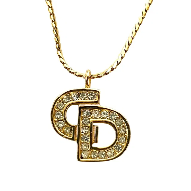 Dior Vintage Logo Rhinestone Necklace Gold Plated in Gold from The Reluxe