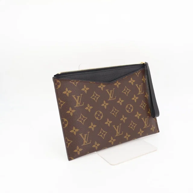 Louis Vuitton Daily Pouch Clutch in Coated canvas from The Reluxe