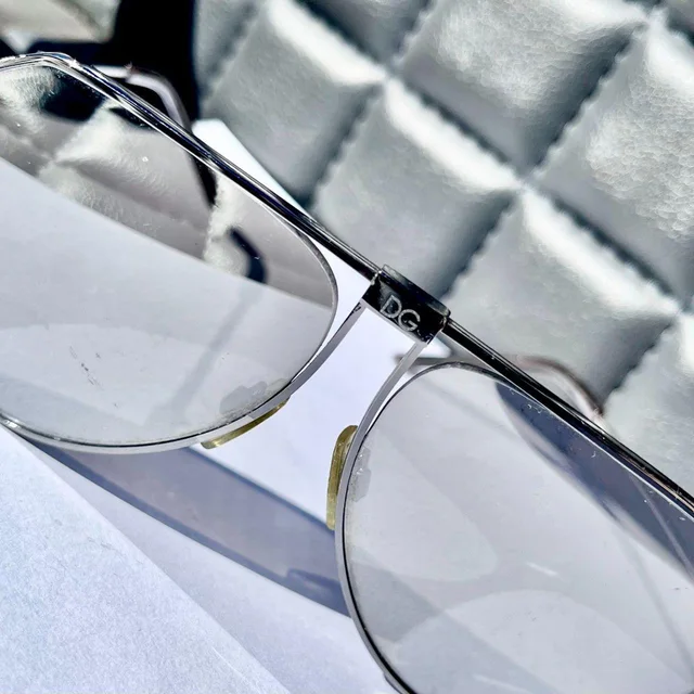 Dolce & Gabbana Women's Aviator Sunglasses - Silver/White in white|gray|silver from Depop, photo 3 of 5