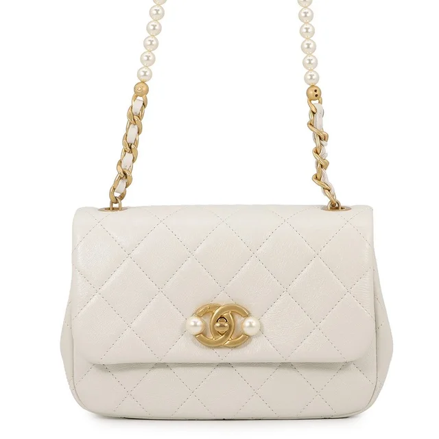 Chanel Chain Shoulder Bag Quilted CC Logo Lambskin White in White Lambskin from The Reluxe