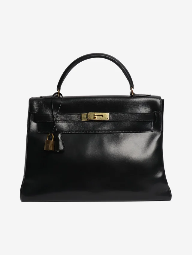Hermès Black vintage Kelly 28 bag in Black Box leather from Sign of the Times