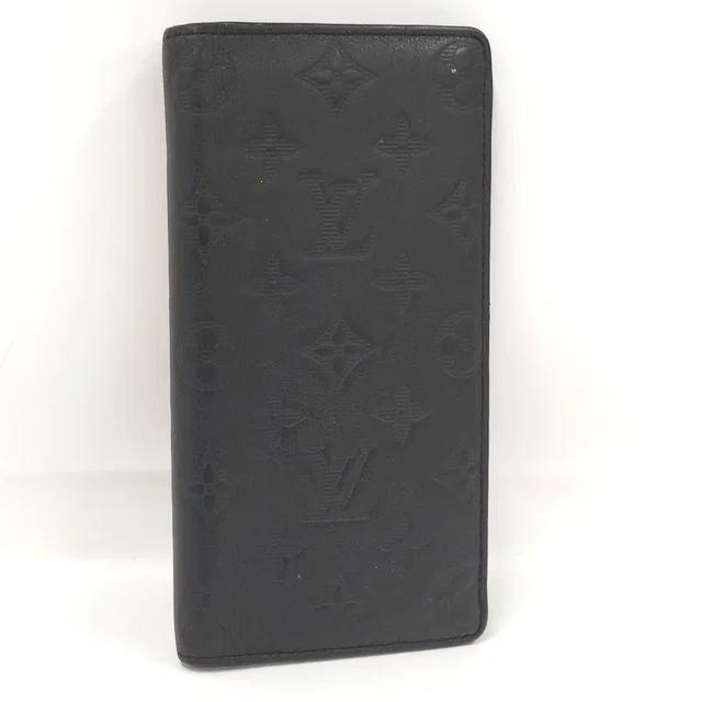 Louis Vuitton Bifold Wallet Portefeuille Brazza Monogram Shadow Noir in Black from The Reluxe
