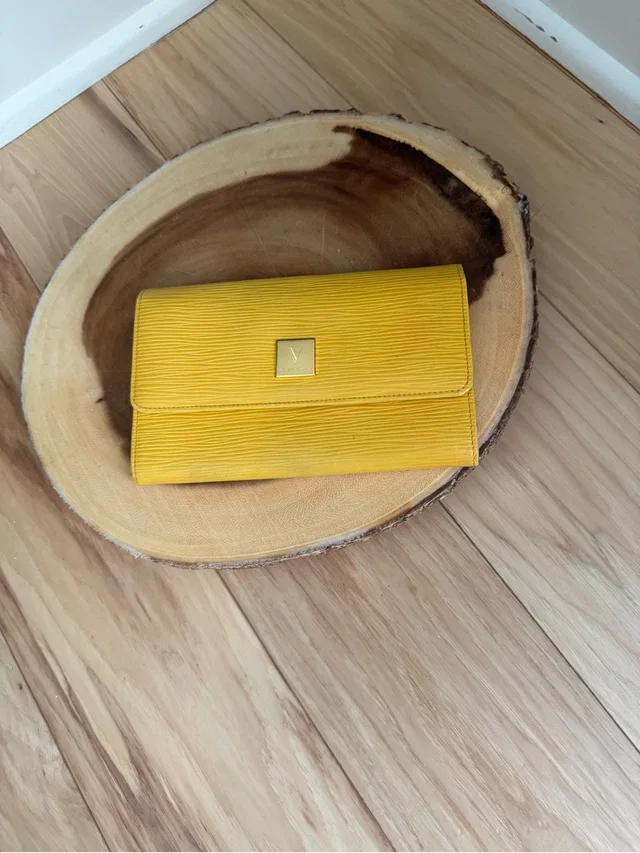 Rudolph Valentino Yellow Textured Wallet Clutch in yellow Leather from Poshmark