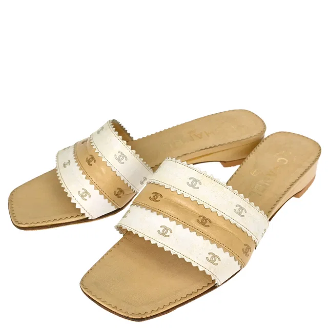 Chanel CC Beige White Leather Mules Shoes #36 in White Leather from AMORE Vintage Tokyo