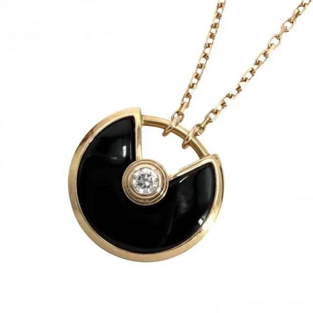 Cartier Necklace Amulet de Star 18K Pink Gold Onyx Diamond in Pink from The Reluxe