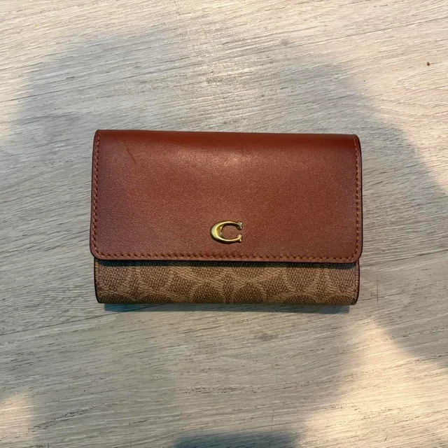 Coach Women's Wallets - Brown in brown|red from Depop, photo 1 of 1