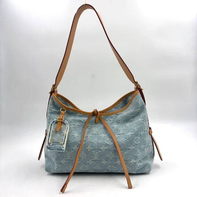 Louis Vuitton Carryall NM PM Monogram Denim Leather Brown Light Blue Bag Gold in Brown Denim from The Reluxe