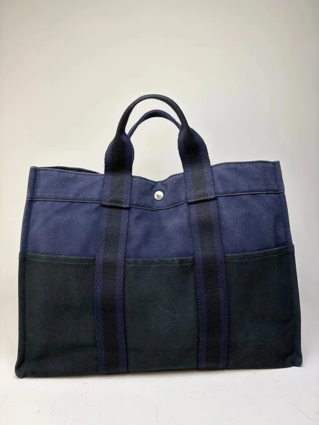 Hermès Vintage Cotton Canvas Tote Navy Black Silver in blue Canvas from Grailed, photo 1 of 1