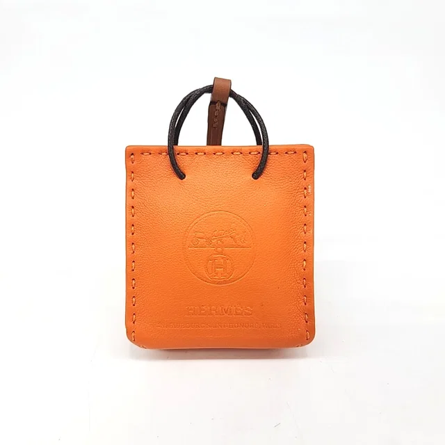 Hermès 에르메스 삭 오랑쥬 백참 (D) from GUGUS
