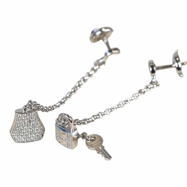 Hermès Kelly Clochette Earrings in White Gold in White from Luxury Promise