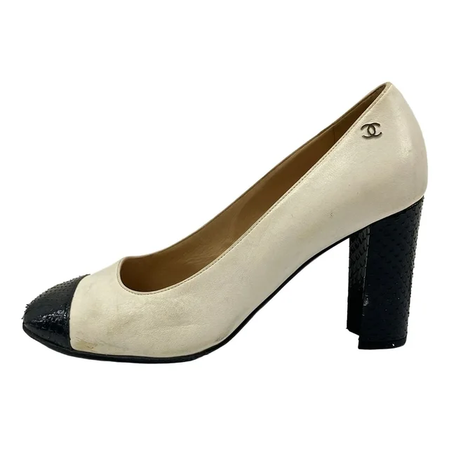 Chanel Pumps White Black CC Logo Lambskin Heels in Black Lambskin from The Reluxe