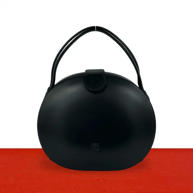 Loewe Vintage Anagram Leather Round Handbag Mini Tote Black in Black Leather from The Reluxe