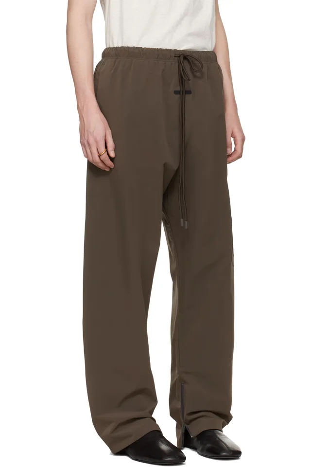 Fear of God ESSENTIALS Brown Active Trace Track Pants, photo 2 of 4 from SSENSE