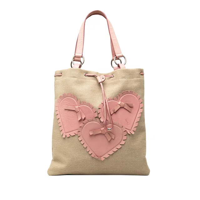 Beige Saint Laurent Canvas Heart Kahala Tote in Beige Canvas from Designer Revival