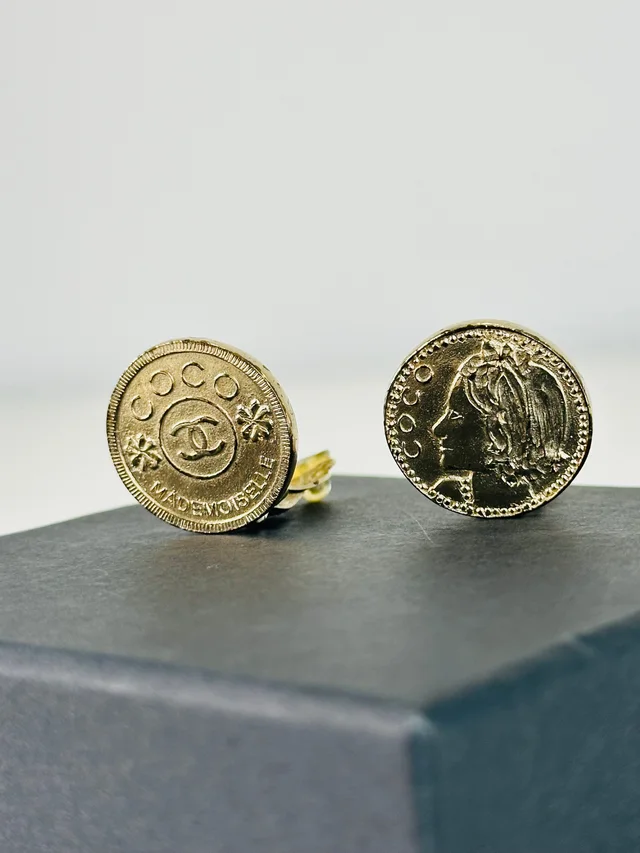 Chanel Gold Plated Mademoiselle Coin Clip-on Earrings in Gold from Edit Second Hand