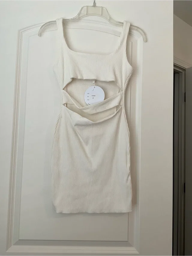 Swarovski Cream Ribbed Cutout Mini Dress in White from Poshmark