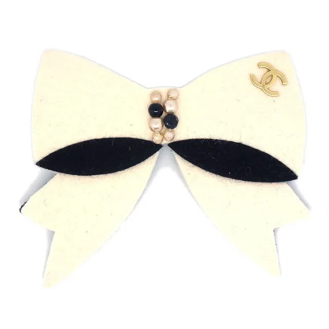 Chanel 2002 Fall Pearl Bow Brooch from AMORE Vintage Tokyo