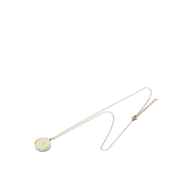 Gold Chanel CC Gold Plated Striped Resin Strass Round Pendant Necklace in Gold Resin from Designer Revival, photo 1 of 1