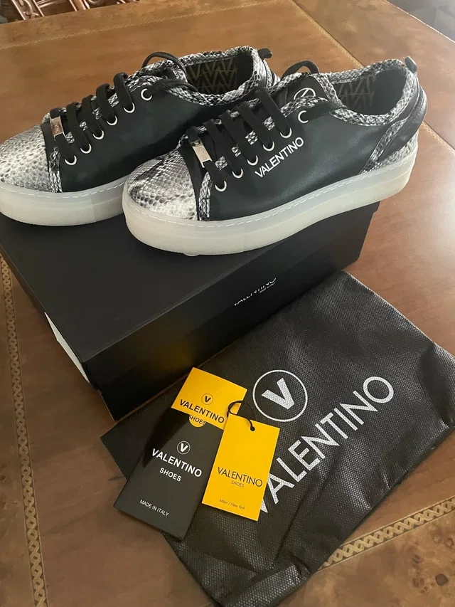 Valentino Garavani Woman’s Black Leather & White Snakeskin Platform Sneakers in white|black Leather from Poshmark