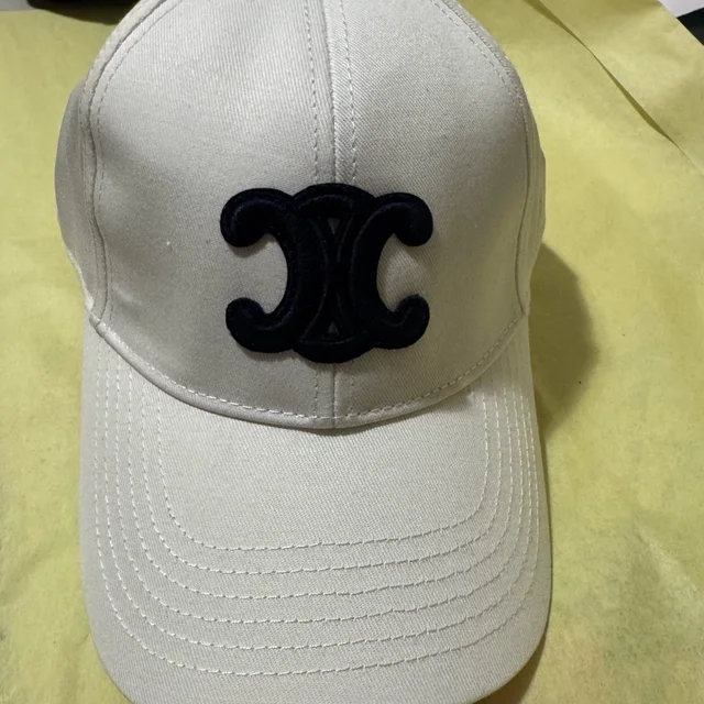 Celine White Cap With Black Accents in black|white from Poshmark, photo 1 of 1