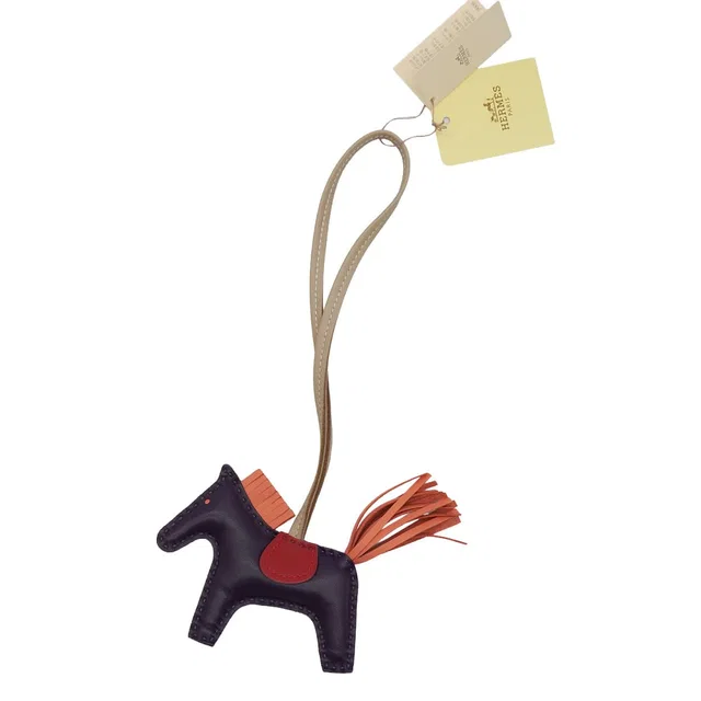 Hermès Bag Charm Rodeo PM Raisin Framingo Agneau Milo 2017 A Stamp from Luxury Promise