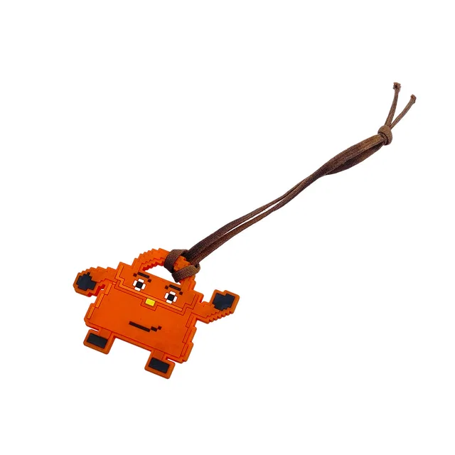 Hermès Kelly Doll Bag Charm Orange Rubber in Orange from Luxury Promise