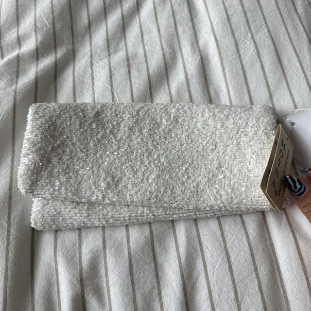 Moynat Women's Clutch bags - White in white from Depop, photo 1 of 1