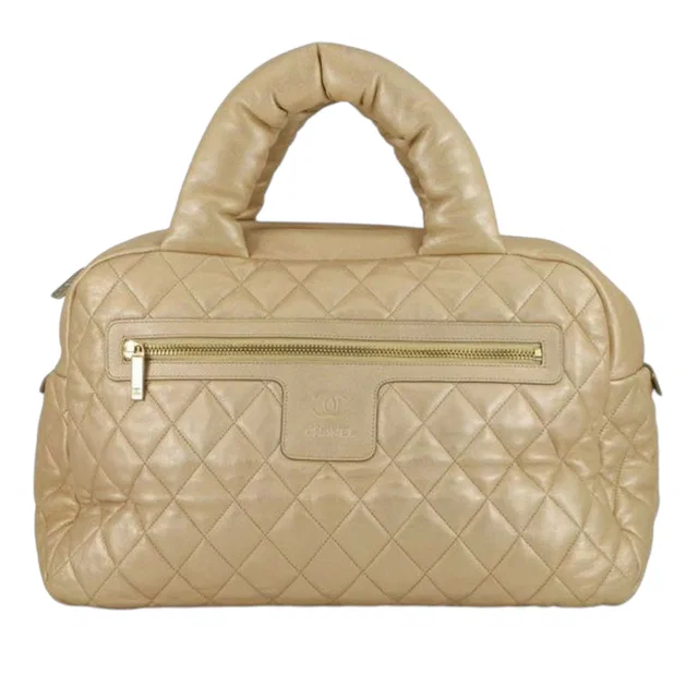 Gold Chanel Quilted Metallic Lambskin Coco Cocoon Bowler Bag in Gold Lambskin from Designer Revival