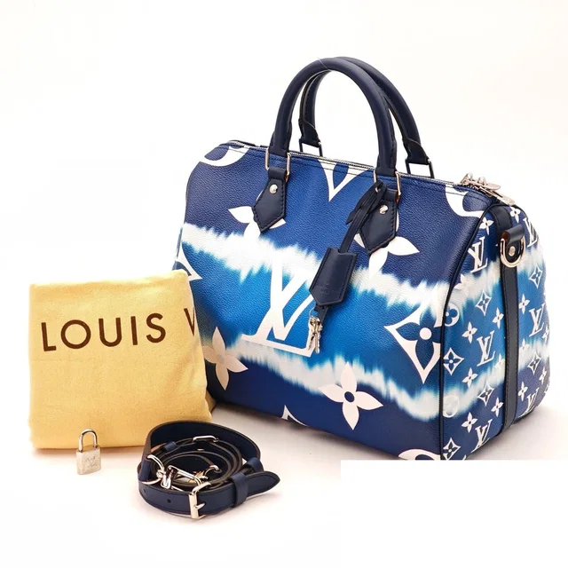 Louis Vuitton Speedy Bandouliere Bag Handbag Blue White Bag Shoulder in White Coated canvas from The Reluxe