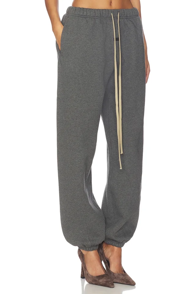 Fear of God ESSENTIALS Classic Sweatpant in Charcoal Heather, photo 2 of 6 from REVOLVE (Canada)