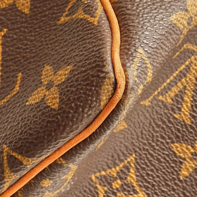Louis Vuitton Monogram Keepall 55 Weekend Bag in Coated canvas from A Retro Tale, photo 7 of 10