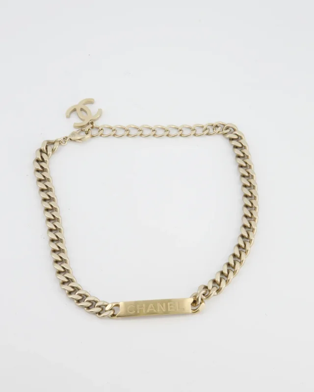 Chanel Gold Curb Link Chain Necklace with Logo Plate and CC Charm in Gold from Sellier, photo 2 of 8
