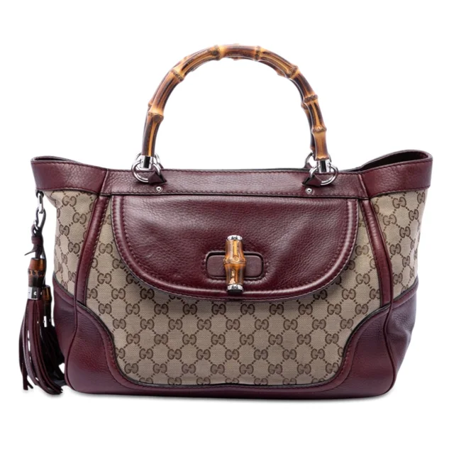 Beige Gucci Medium GG Canvas New Bamboo Tassel Tote in Beige Canvas from Designer Revival, photo 1 of 1