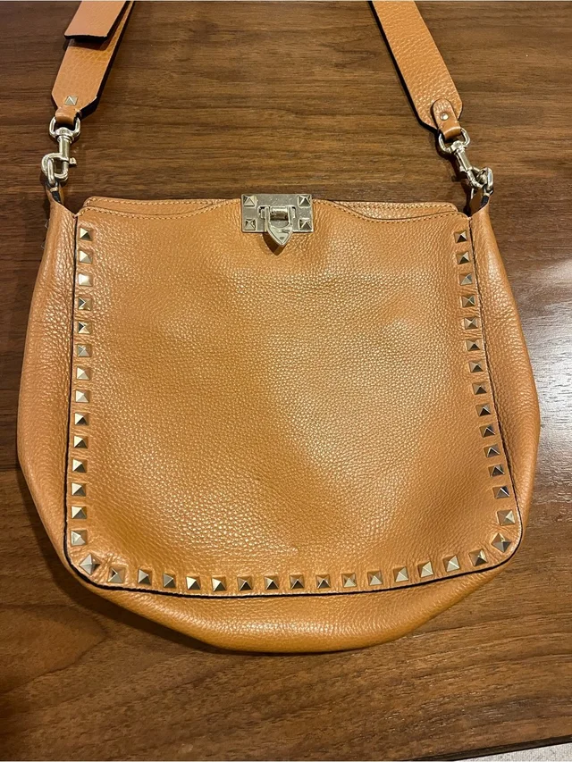 Valentino Garavani Studded Crossbody Bag in brown|neutral Leather from Poshmark