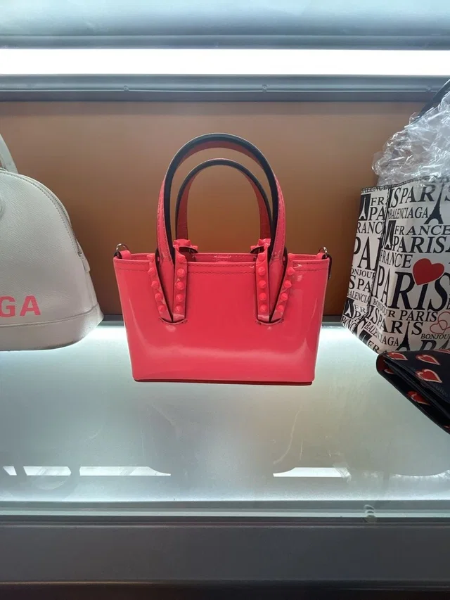 Christian Louboutin Cabata Nano Patent Leather Tote Bag in pink Patent leather from Poshmark