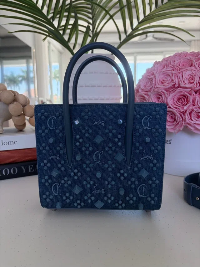 Christian Louboutin Dark Blue Mini Tote With Embossed Motif in blue from Poshmark