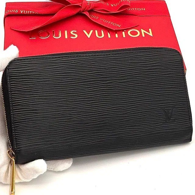 Louis Vuitton Wallet Epi Zippy Black Gold in Black from The Reluxe