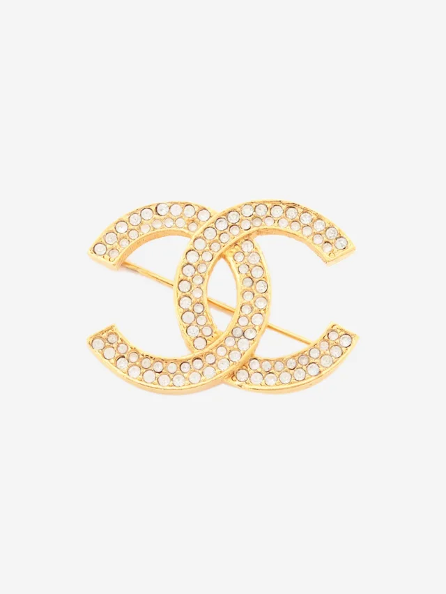 Chanel Gold rhinestone CC brooch in Gold from Sign of the Times