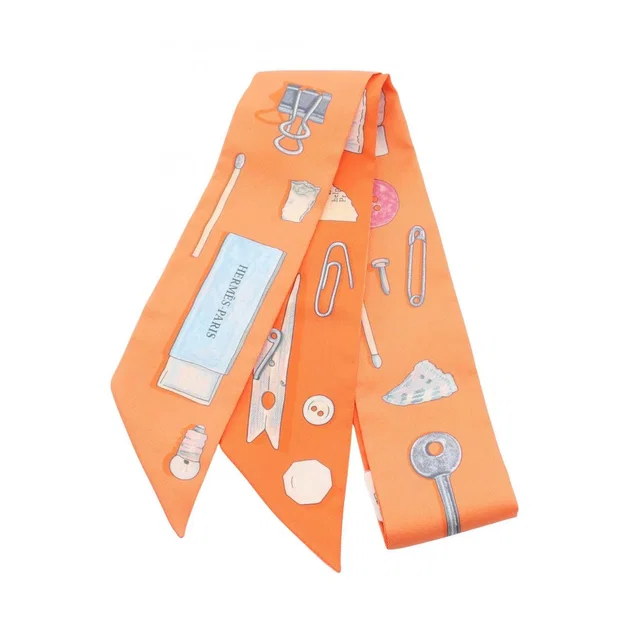 Hermès Scarf Twilly in Orange Silk from The Reluxe