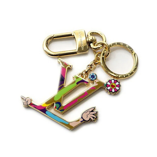 Louis Vuitton Key Ring Super Flat Takashi Murakami Gold Metal Key Holder in Gold from The Reluxe