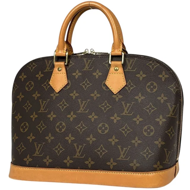 Louis Vuitton Alma Handbag Monogram Brown in Brown from The Reluxe